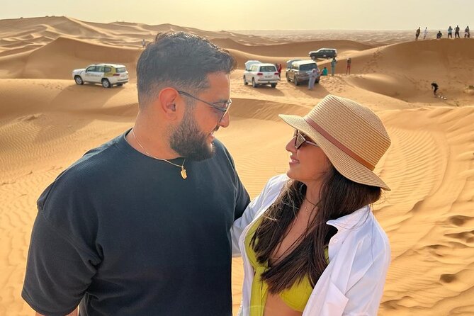 Dubai Desert Safari with Quad Bike, Camel Ride, Dinner and Show - Quad biking in a restricted desert area