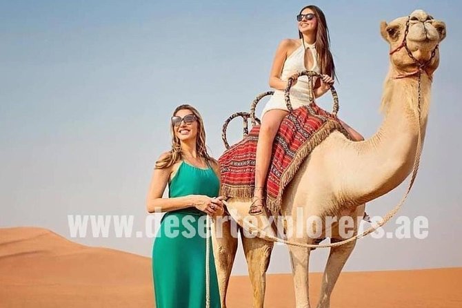 Dubai Desert Safari with Quad Bike, sandboarding, live show & BBQ - Sandboarding without the fuss