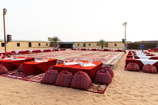 Dubai Desert Safari with Quads, BBQ Dinner, Camel ride, & Shows - Camel riding, sand art, and henna