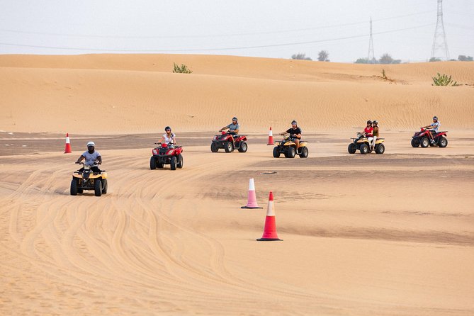 Dubai Desert Safari with Quads, BBQ Dinner, Camel ride, & Shows - Belly dancing and the spinning tanoura show