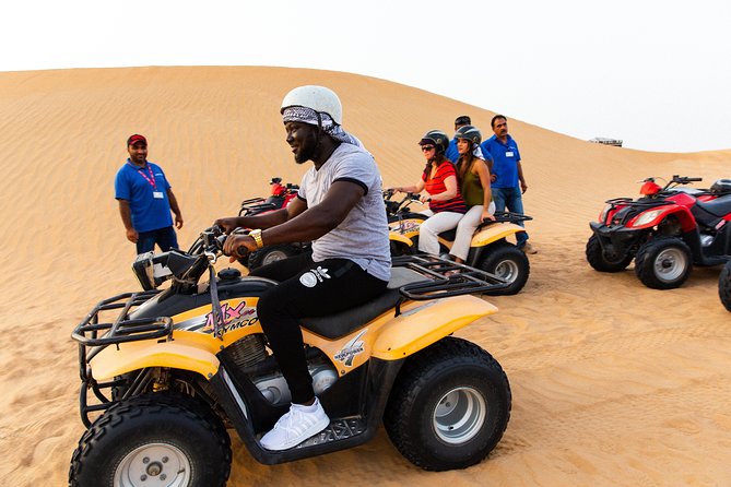 Dubai Desert Safari with Quads, BBQ Dinner, Camel ride, & Shows - What guides add to the experience