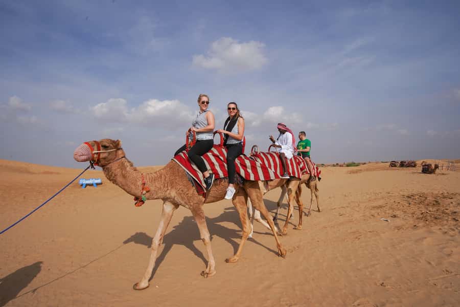 Dubai: Dune Buggy Desert Safari, Camel Ride & Sandboarding - Sandboarding after the engine noise