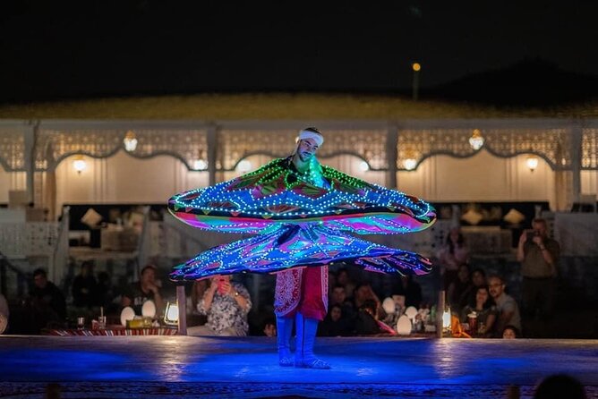 Dubai Dunes Safari With Quad Bike, Camel Ride, BBQ Dinner & Live Shows - Sandboarding adds a quieter kind of fun