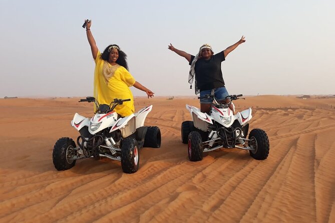 Dubai Dunes Safari With Quad Bike, Camel Ride, BBQ Dinner & Live Shows - Camel riding at sunset