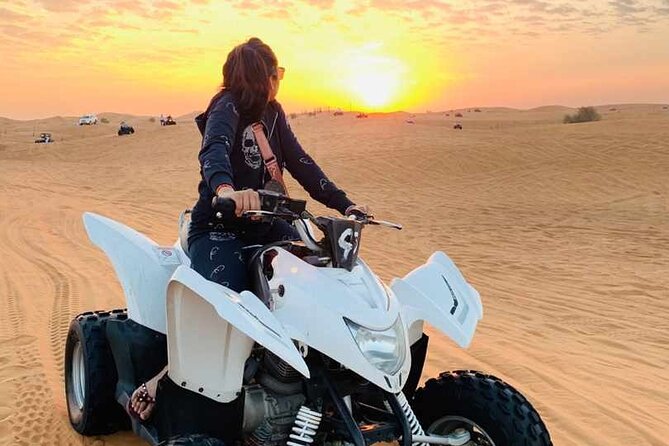 Dubai Dunes Safari With Quad Bike, Camel Ride, BBQ Dinner & Live Shows - Belly dance, Tanura and fire performances