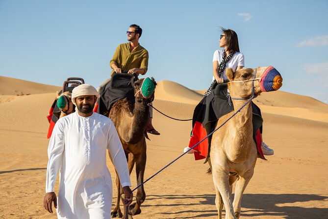 Dubai Evening Desert Safari: Sandboarding, BBQ, Camel Ride & more - Cultural entertainment after dark