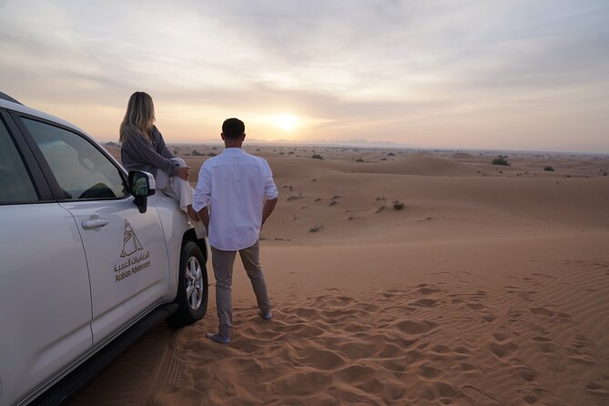 Dubai Evening Desert Safari: Sandboarding, BBQ, Camel Ride & more - Dune bashing: thrilling, but not gentle