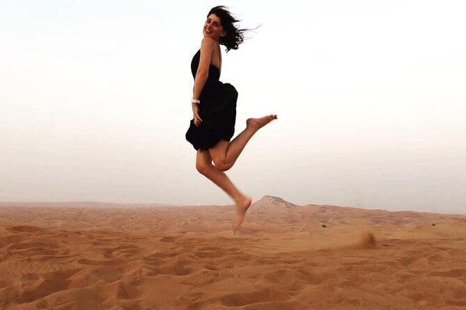 Dubai Evening Desert Safari with BBQ & Live Entertainment - Henna, falcon photos, and camp activities