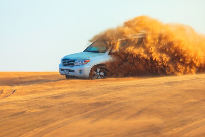 Dubai Evening Desert Safari With Transfers Dune Bashing & Dinner - From Dubai towers to Lahbab dunes