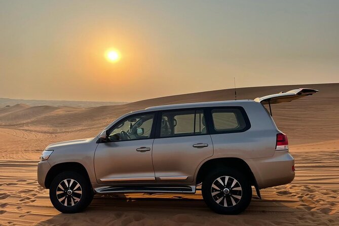 Dubai Evening Desert Safari With Transfers Dune Bashing & Dinner - The camel ride is brief, but still worth trying