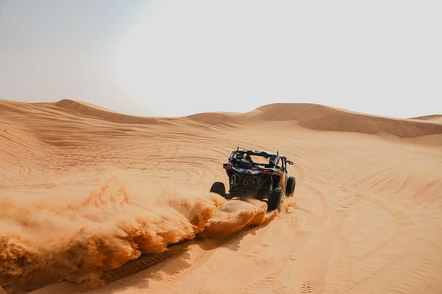 Dubai: Extreme Can-Am Buggy Desert Safari Adventure - Taking the wheel in Dubai’s red dunes