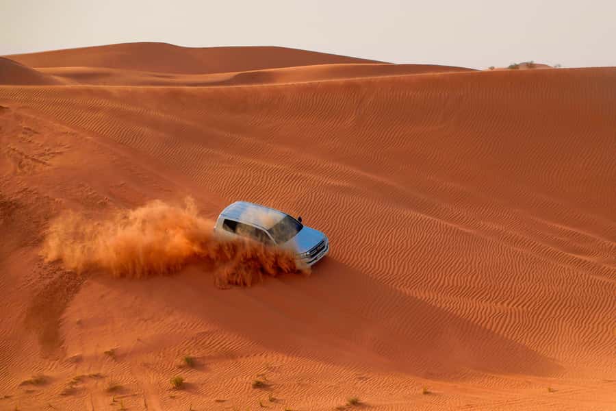 Dubai: Helicopter Ride, Desert Safari, Camels & Refreshments - Hotel pickup and the road to Lahbab