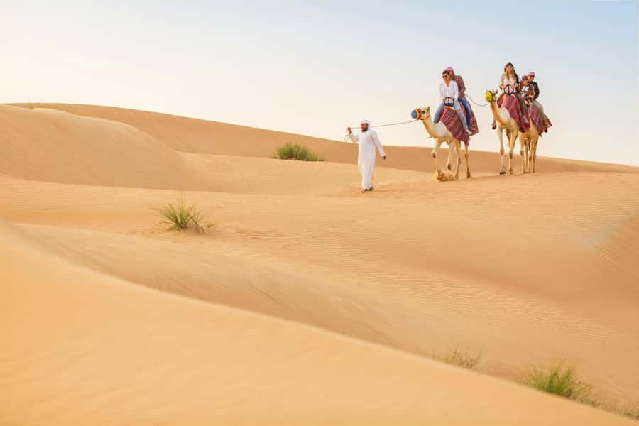 Dubai: Heritage Camel Desert Safari with Traditional Dinner - A Bedouin-style camp with hands-on traditions