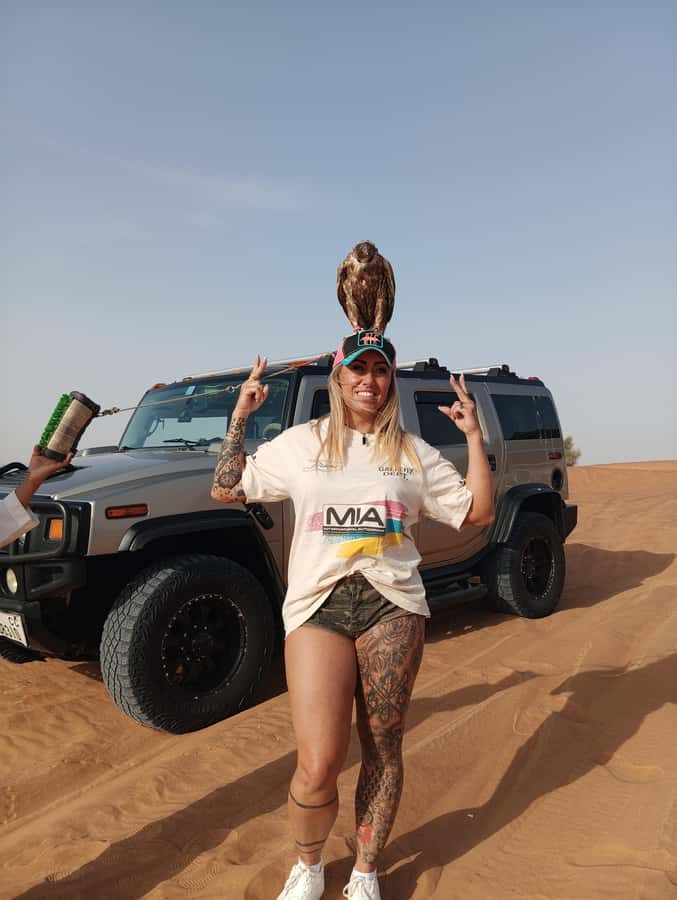 Dubai Hummer Safari Adventure & Traditional Dress Photoshoot - Sandboarding and the short camel ride