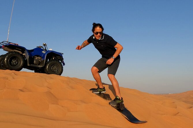 Dubai: Jeep Desert Safari, Camel Ride, and Quad Bike Tour - Quad biking at Lahbab, with a safety briefing first