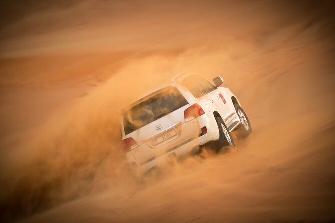 Dubai Morning Desert Safari with Quad Biking & More Activities - A short camel ride and desert photographs