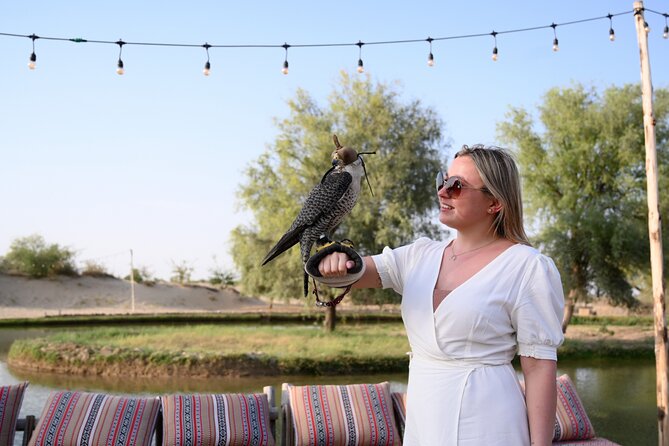 Dubai: Morning Heritage Safari by Vintage G Class & Al Marmoom Oasis - Arabic clothing and falcon photographs