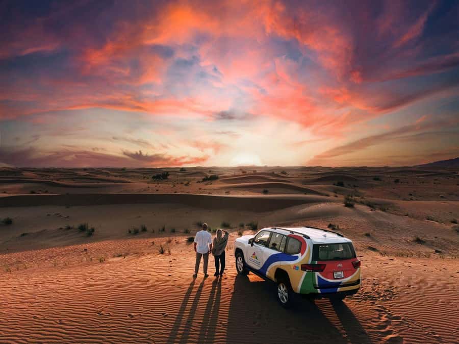 Dubai: Premium Desert Safari, Camel Ride, BBQ & Sandboarding - From Dubai hotel pickup to the Fort Lisaili dunes