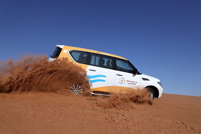Dubai Premium Desert Safari with Live shows & Gourmet Dinner - The red dunes of Lahbab set the tone
