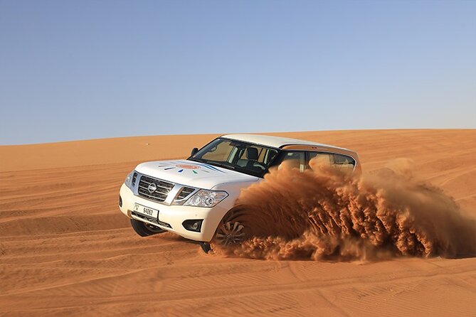 Dubai Premium Desert Safari with Live shows & Gourmet Dinner - A sunset stop worth protecting your camera battery for