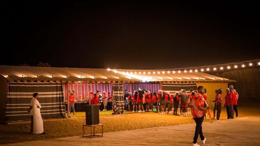 Dubai: Premium Red Dune Safari with Sandboarding & BBQ - BBQ dinner and evening entertainment
