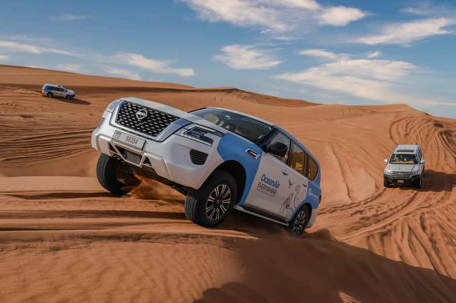 Dubai: Premium Safari, Camel Ride & Al Khayma Camp 3-Buffets - Arriving at Al Khayma Camp with coffee and dates