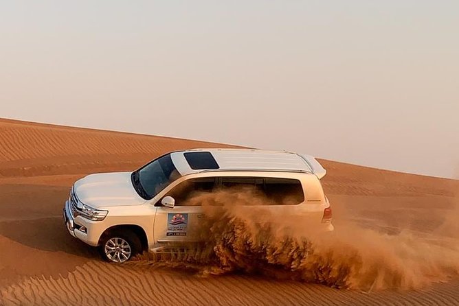 Dubai Private Morning Desert Safari: Camel Ride & Sandboarding - Sandboarding on the dunes