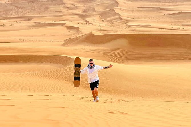 Dubai: Quad Bike Safari, Camels, & Camp with BBQ Dinner - Getting ready for the quad bike
