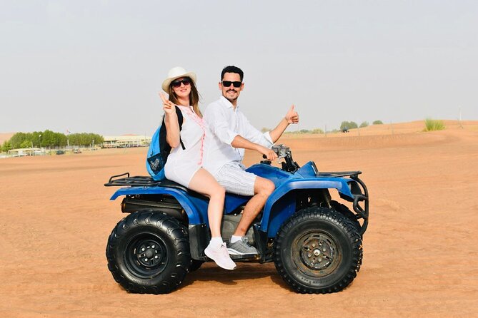 Dubai: Red Dunes Desert Safari, Camel ride, Sandboard, Quad Bike - Arabic coffee, dates, and the Bedouin-style camp