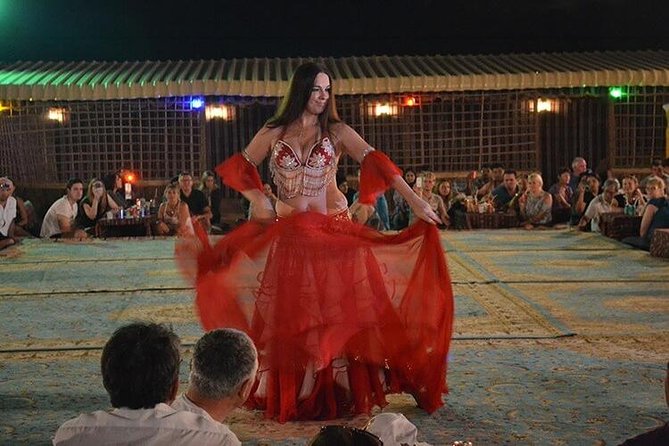 Dubai Red Dunes Desert Safari : Sandboarding, BBQ & Live Shows - Sunset photos and the traditional camp welcome