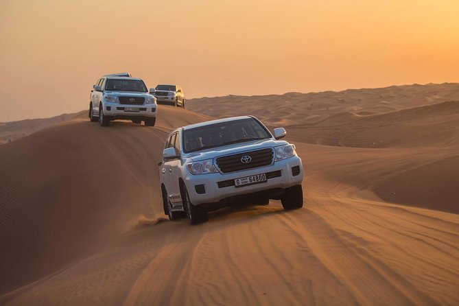 Dubai Red Dunes Desert Safari : Sandboarding, BBQ & Live Shows - Pickup from Dubai, with the practical details handled