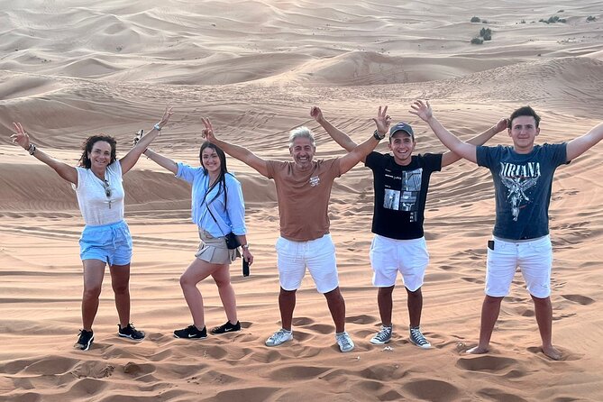 Dubai Red Dunes Safari, ATV, Camel ride, BBQ at Desert Camp - Dune bashing across the red sand