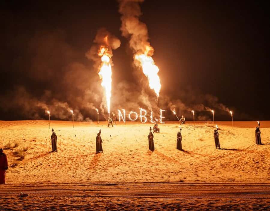 Dubai’s Best Desert Safari: Live Show & Gourmet BBQ Dinner - Arriving at Noble Camp through the Arabic souq