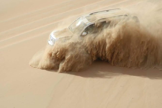 Dubai: Unique SUNSET 4WD Red Dunes Safari - Sandboarding and the high dune sunset stop