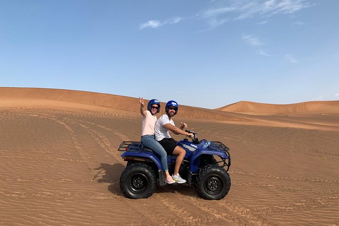 Dubai: Unique SUNSET Quad Bike Red Dunes Safari - Sunset at the highest dunes