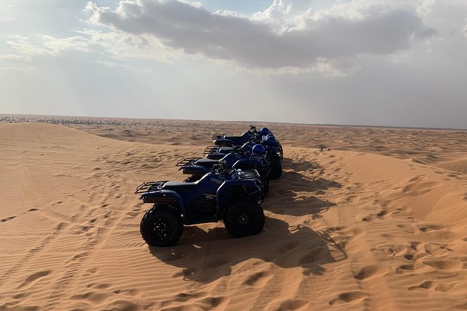 Dubai: Unique SUNSET Quad Bike Red Dunes Safari - What the $99 price really covers