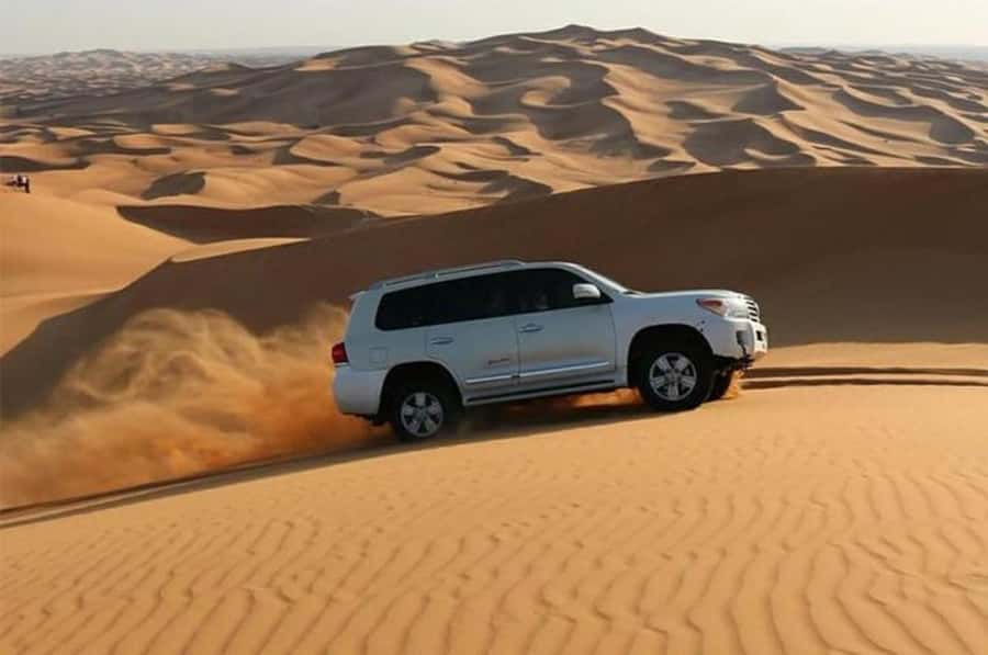 Dune Bashing &Beyond The Ultimate Desert Safari From Doha - Red dunes and the thrill of 4WD driving