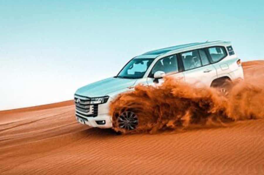 Dune Bashing &Beyond The Ultimate Desert Safari From Doha - Sandboarding, camel riding, and the parts that vary