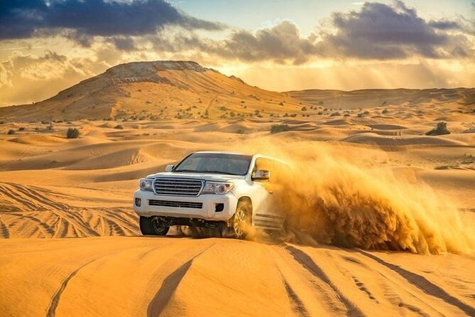 DuneBashing, CamelRide & ATV Bike Desert Safari Experince in Doha - One hour of dune bashing across the sand
