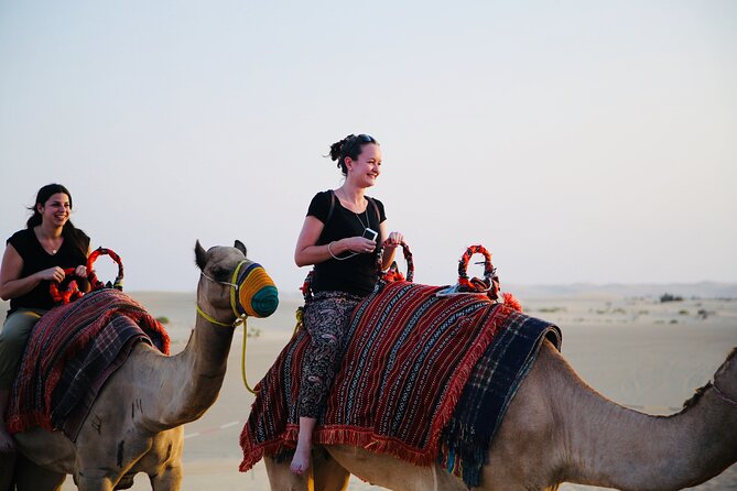 Evening Desert Safari Abu Dhabi with Hot BBQ Dinner - Sandboarding, skiing, henna, and shisha