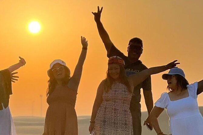 Evening Desert Safari Abu Dhabi with Hot BBQ Dinner - Sunset from the highest dune