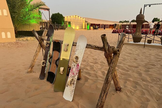 Evening Desert Safari Camel Ride Dinner Live Shows in Abu Dhabi - BBQ dinner beneath the evening sky