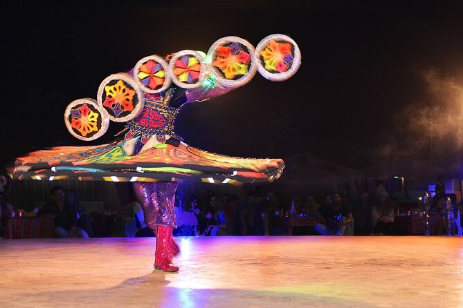 Evening Desert Safari Dubai with Camel Riding & BBQ Buffet Dinner - Belly dancing, fire, tanura, and Arabic performances