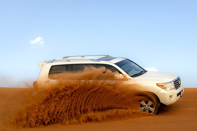 Evening Desert Safari in Dubai, Sandboard & BBQ Dinner - From Dubai towers to Lahbab’s red dunes
