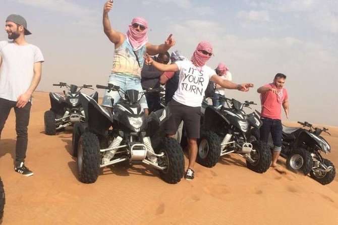 Evening Red Dunes Safari with Quad Biking, BBQ Dinner & LiveShows - Sunset photos and the desert camp