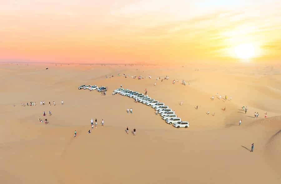 From Abu Dhabi: Dune Bashing Desert Safari - Camels, sandboarding, and the camp