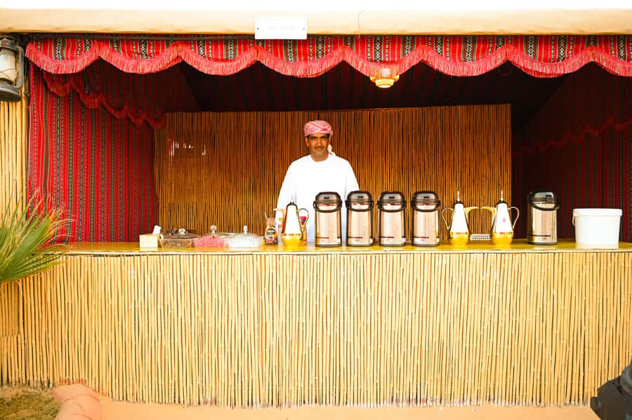 From Abu Dhabi: Dune Bashing Desert Safari - Sunset, BBQ, and Arabic entertainment