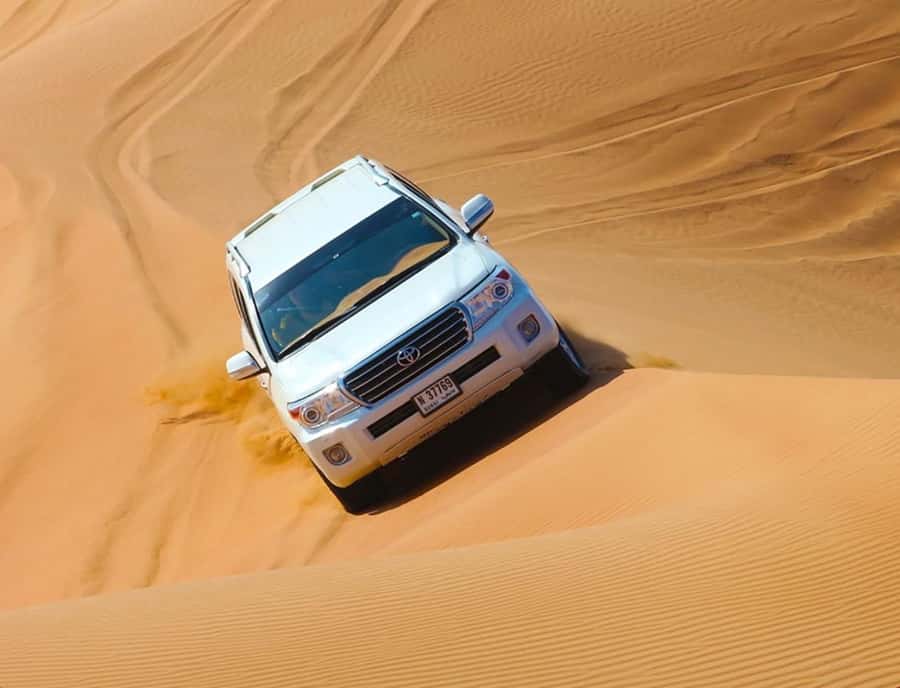 From Doha: Inland Sea Desert Safari with All Activities - Dune bashing brings the main rush