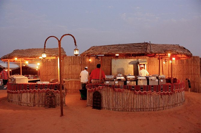 Full Day Desert Safari with Buffet Dinner,Sand Boarding & Camel Ride - Sandboarding sounds easy until the heat arrives
