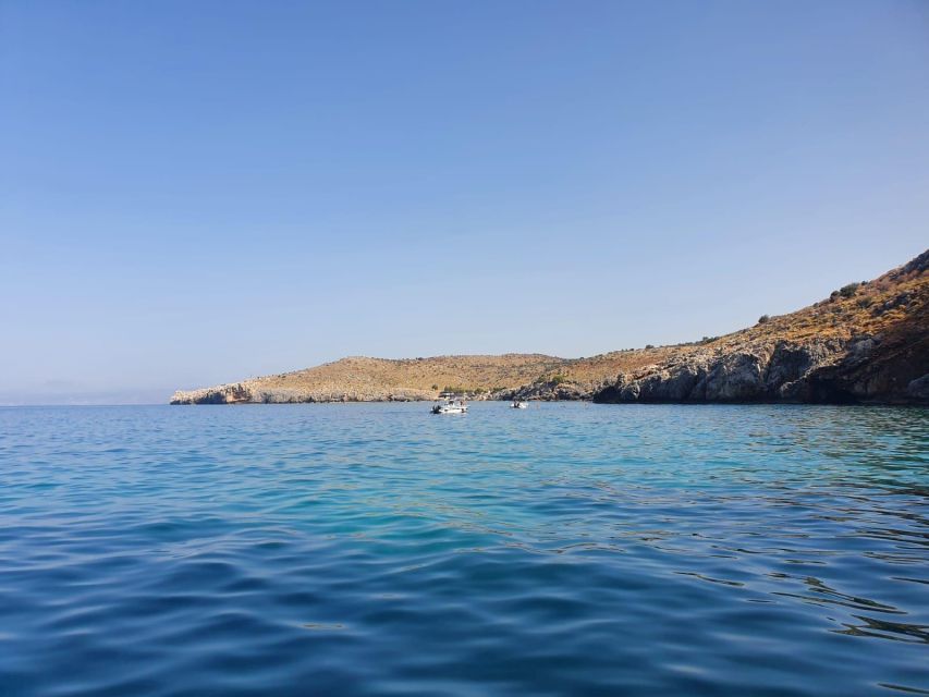 Georgioupolis: Rent a Boat Safari Sea Tour - Following the guide toward caves and the lighthouse